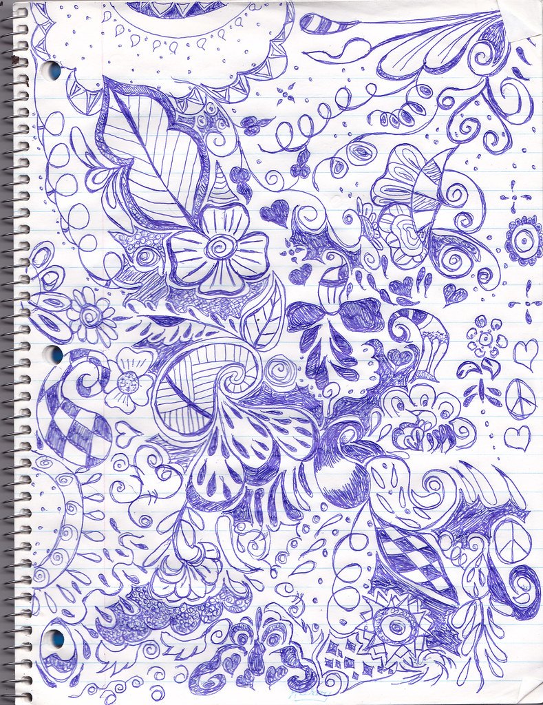 Ballpoint doodle in a notebook: rosettes, sunbursts and loops, the same forms children discover. Photo: Tabcat75, CC BY 2.0.